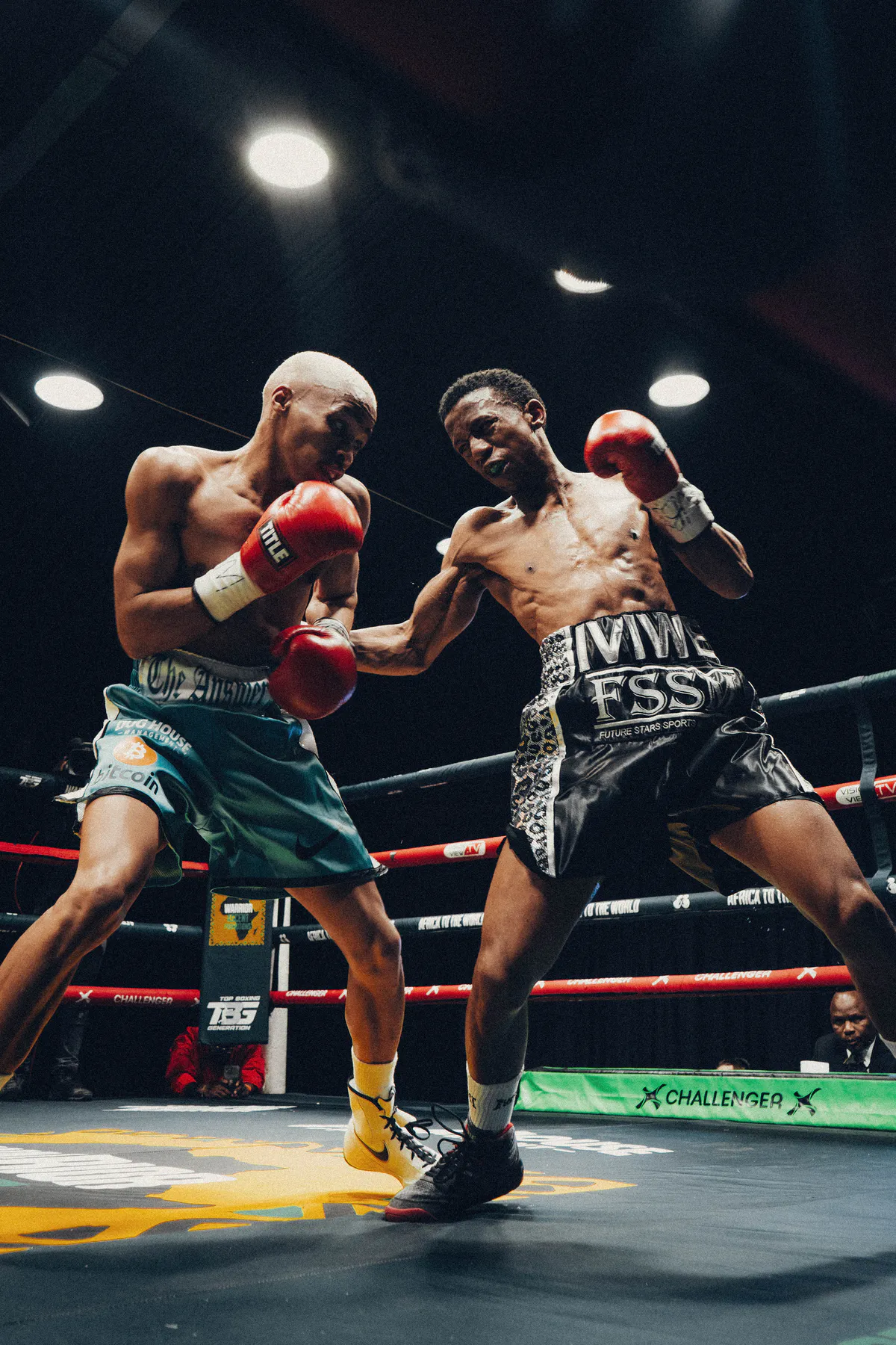 Mpendulo Msimanga exchanges punches with Iviwe Mgema during the Black Flag main event.