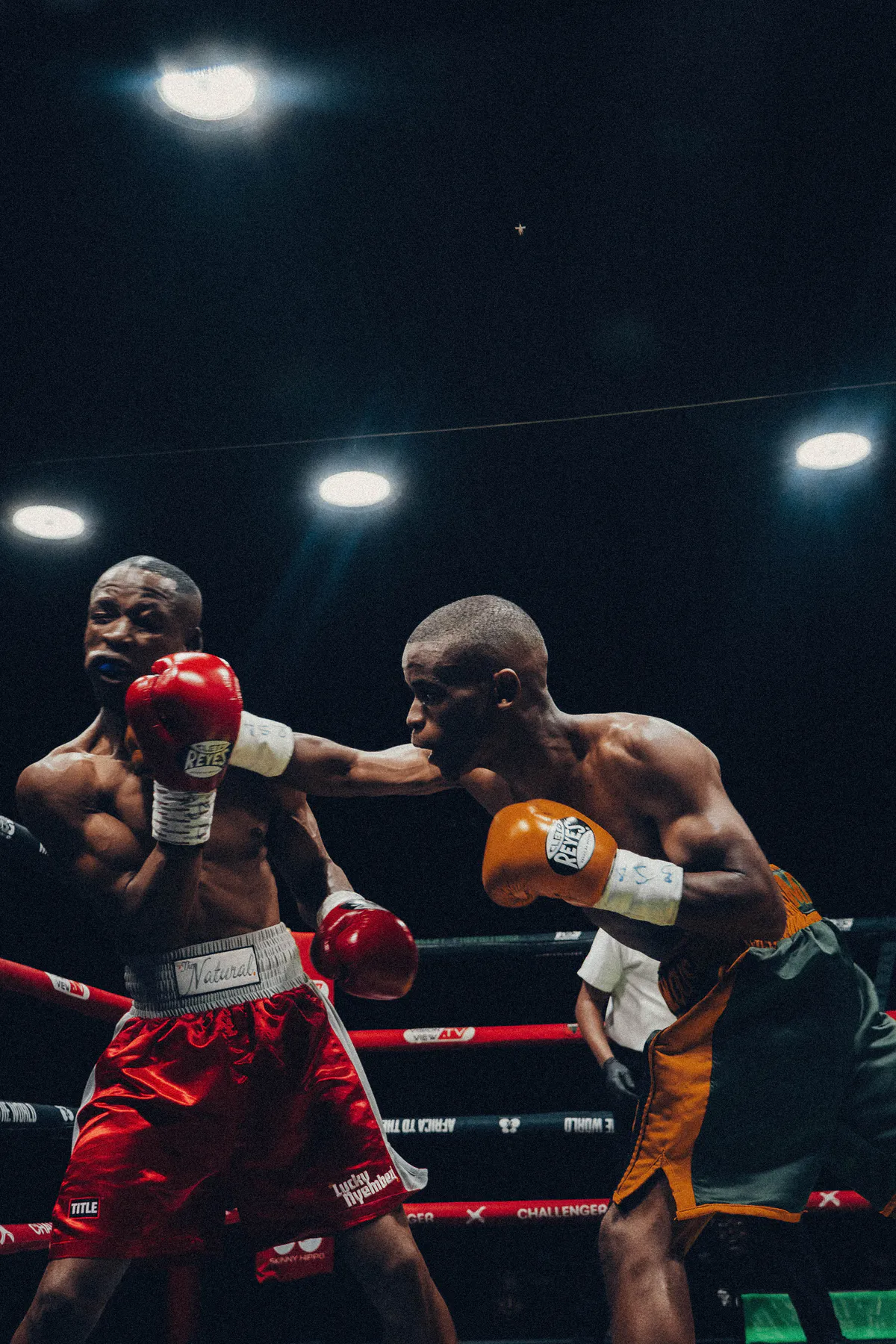 Thando Mthembu lands a punch against Lucky Nyembezi at Black Flag