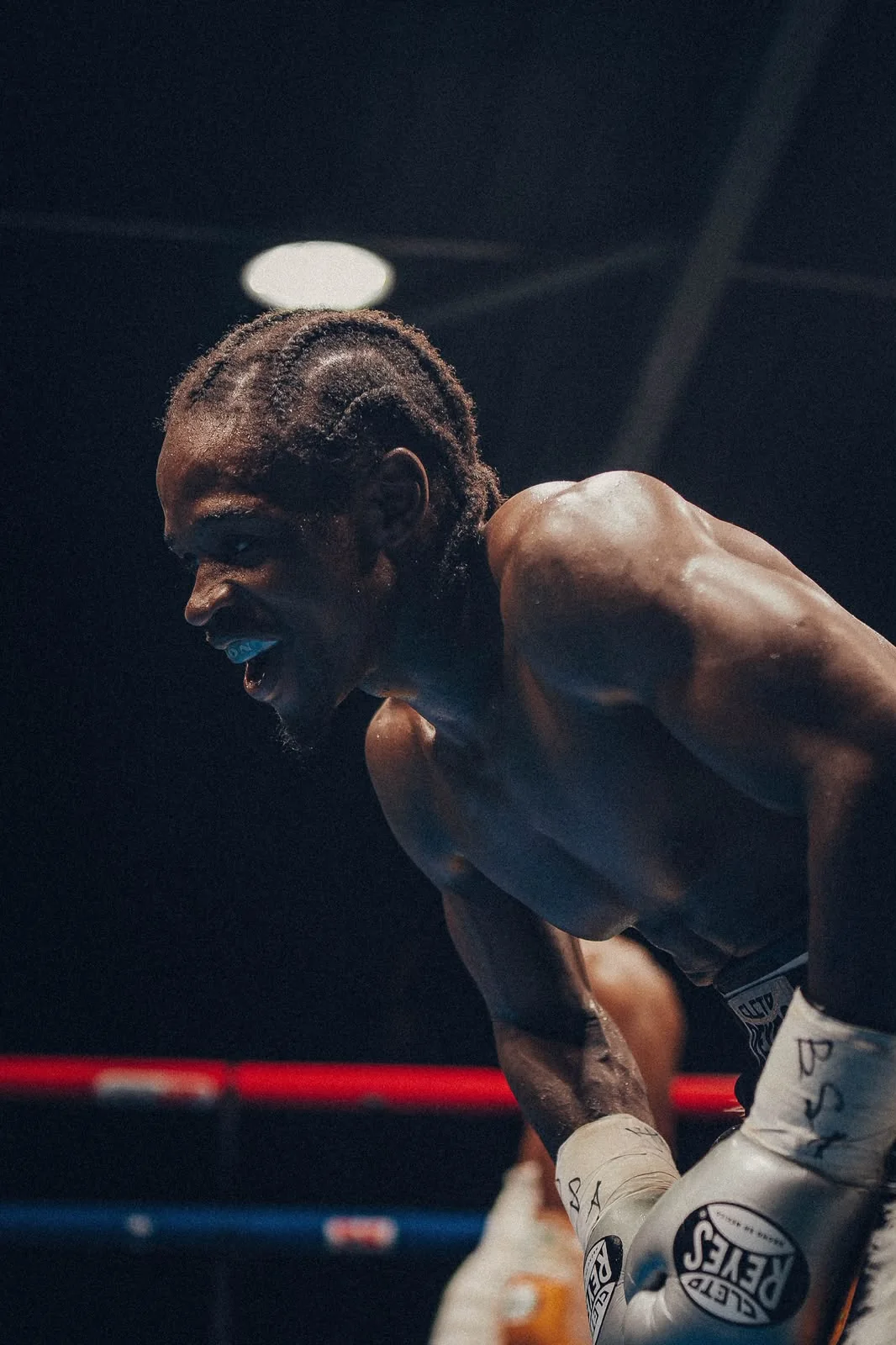 A boxer reacts between exchanges in a Warrior Ascent bout